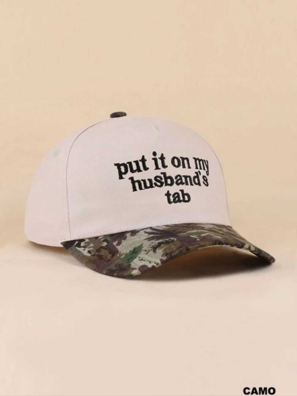 Put It On My Husbands Tab Camo Trucker Hat